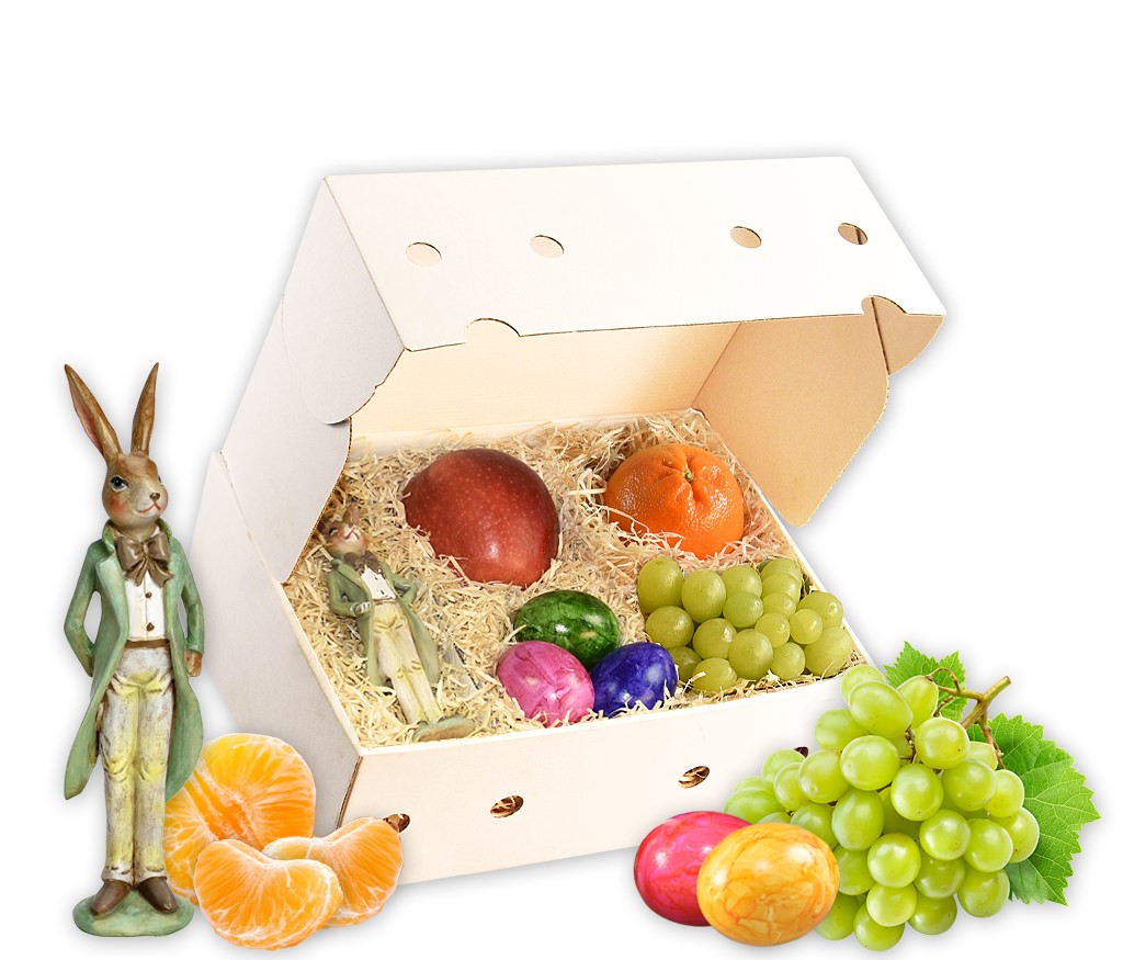 Obstbox Kleiner Osterhase mit einem Dekohasen bunten Eiern und frischem Obst