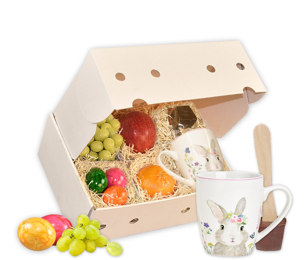 Obstbox Heiße Oster-Schokolade mit bunten Eiern, Tasse, Schokolöffel und frischem Obst